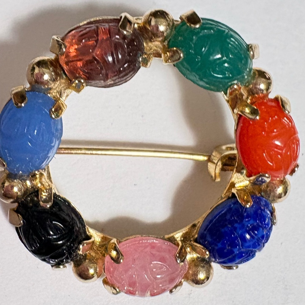 Colorful vintage gold tone Scarab carved glass Circle Brooch